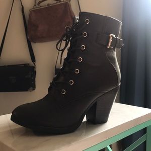 Brown leather high heeled booties